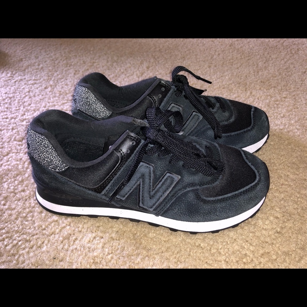 New Balance Classics (sz 8) black in color